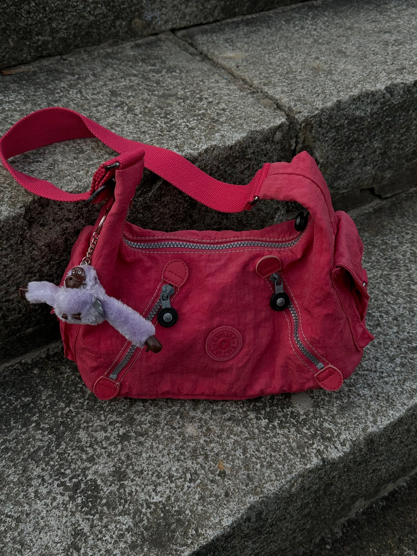 Рожева сумка багет Kipling