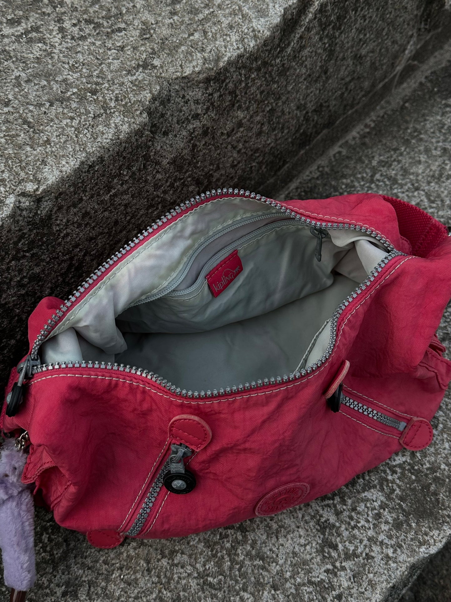 Рожева сумка багет Kipling